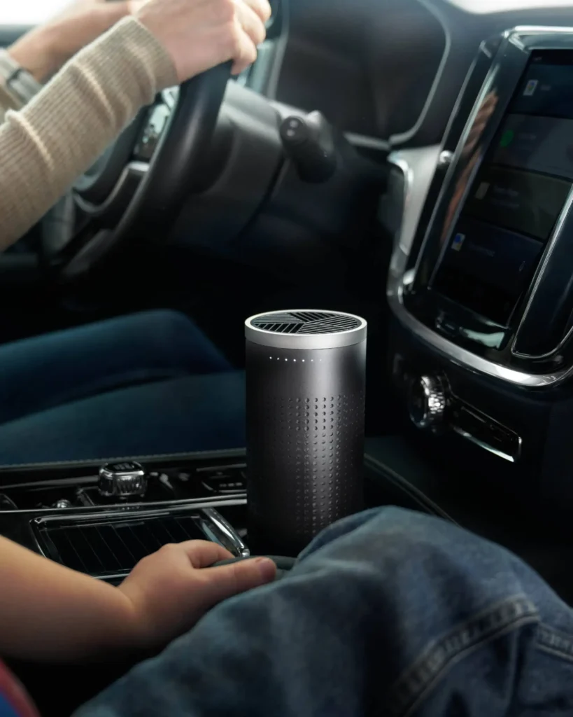 USB-powered purifier plugged into a car port